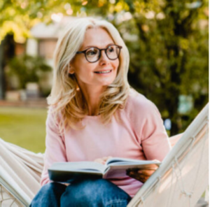 Woman Smiling After Getting Dental Implants in Apple Valley, Savage, MN, Eagan, Burnsville, Shakopee